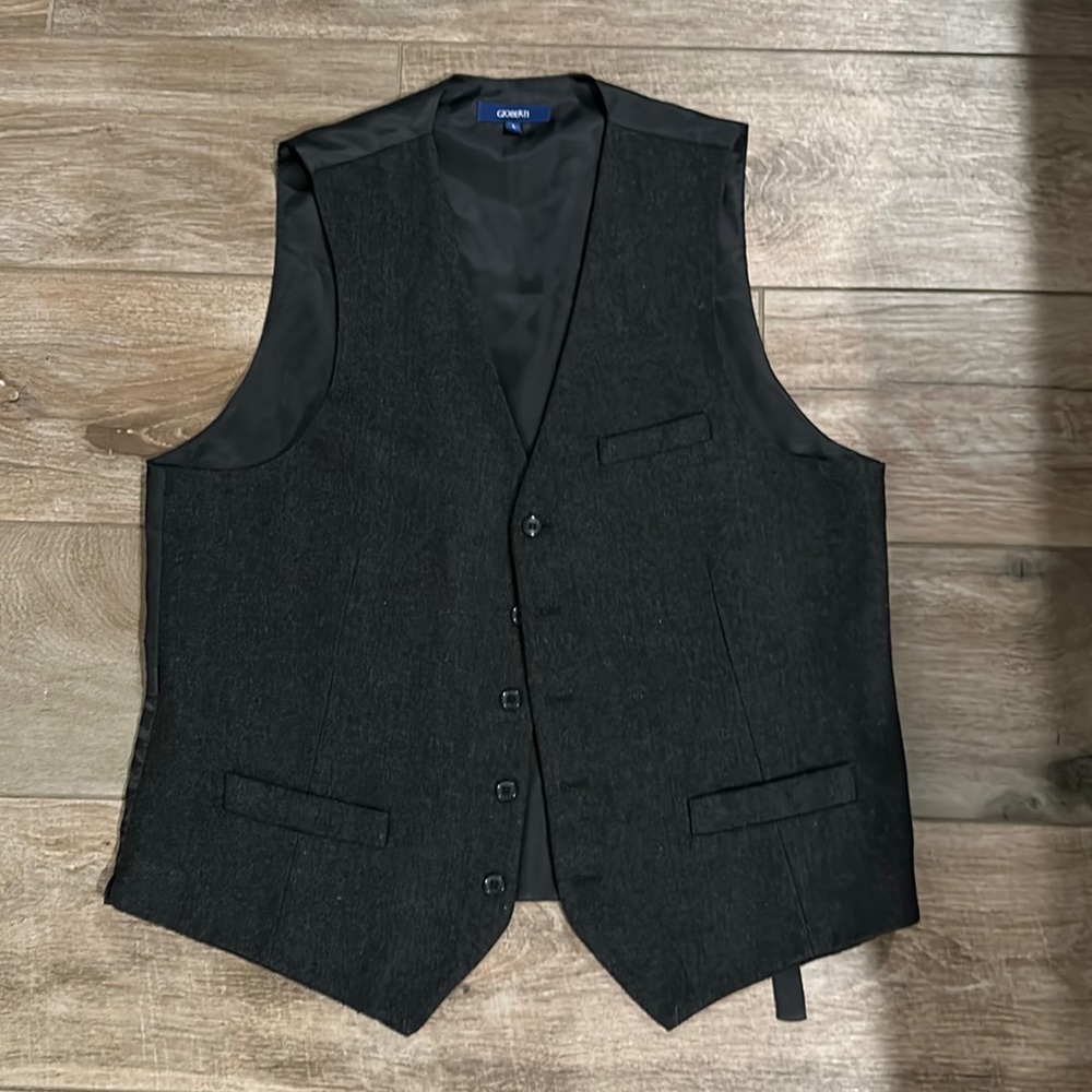 Grey vest purchased for an event. Worn once. In excellent condition.